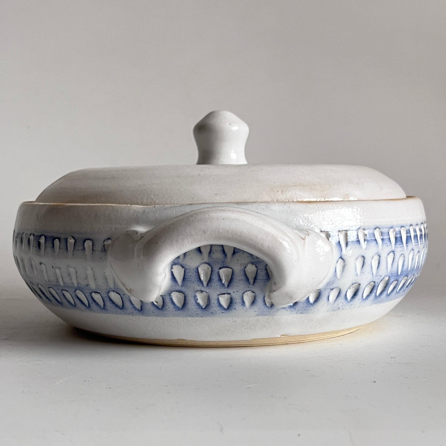 White & Blue Casserole w/ carved pattern